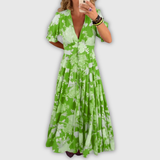 NOSTRA Ljubljana | Minelda - Elegantna haljina s V-izrezom