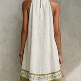 NOSTRA Ljubljana | Agathe - Mini Bezrukavni Cvjetni A-Linijski Haljina u Bijeloj i Maslinastoj Zelenoj